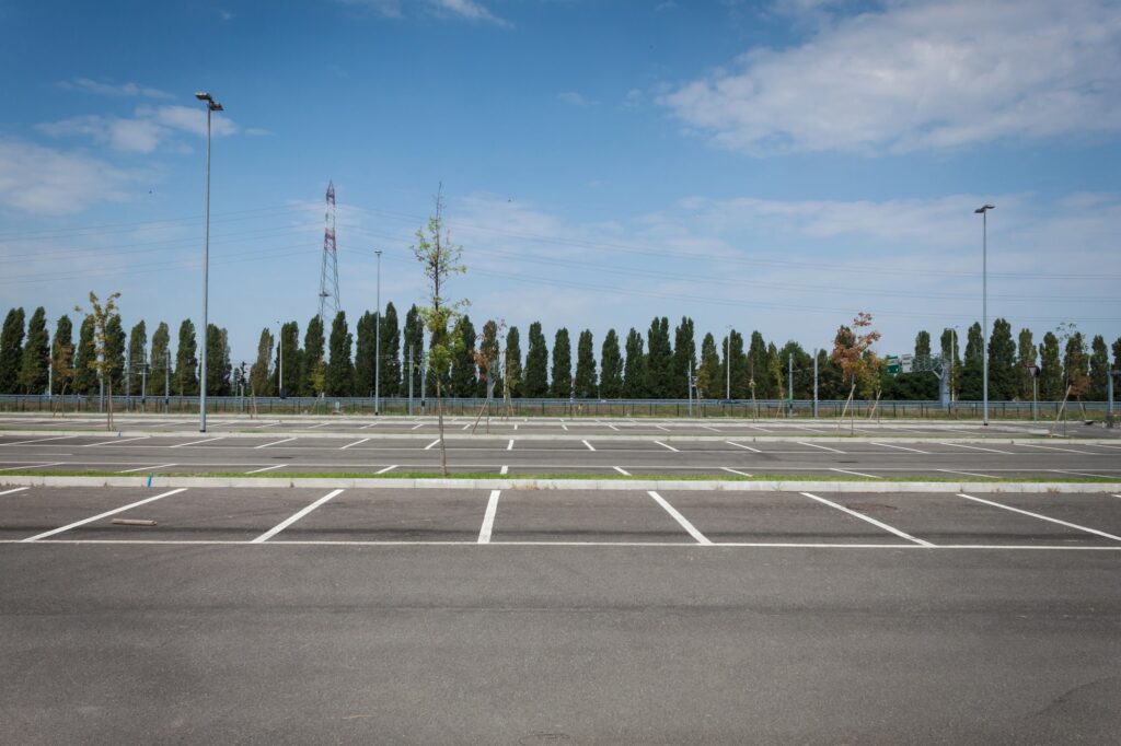 Understanding the Sealcoating Process and Benefits for Your Parking Lot