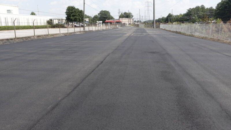 Large area of asphalt that has been repaved.