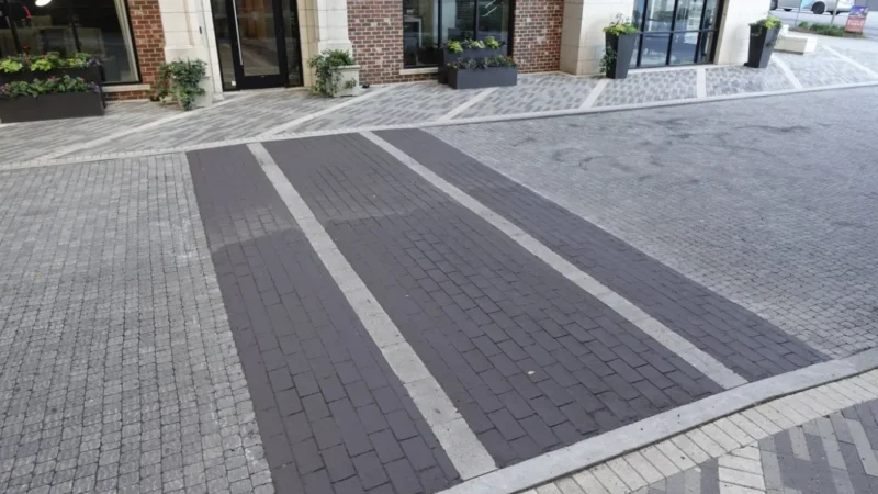 Concrete brick road with a crosswalk